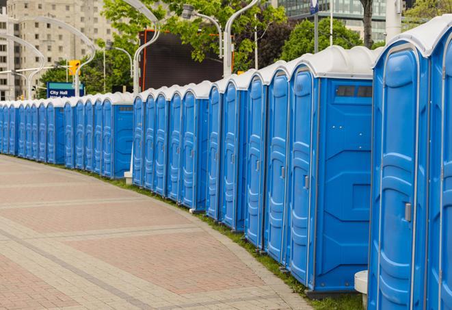 a row of portable restrooms at a fairground, offering visitors a clean and hassle-free experience in canutillo